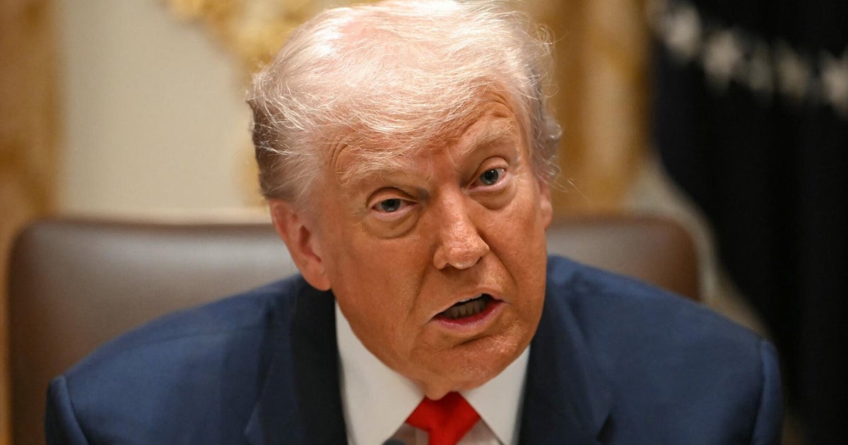 Trump accuses China of "purposefully not buying" U.S. soybeans, threatens trade retaliation