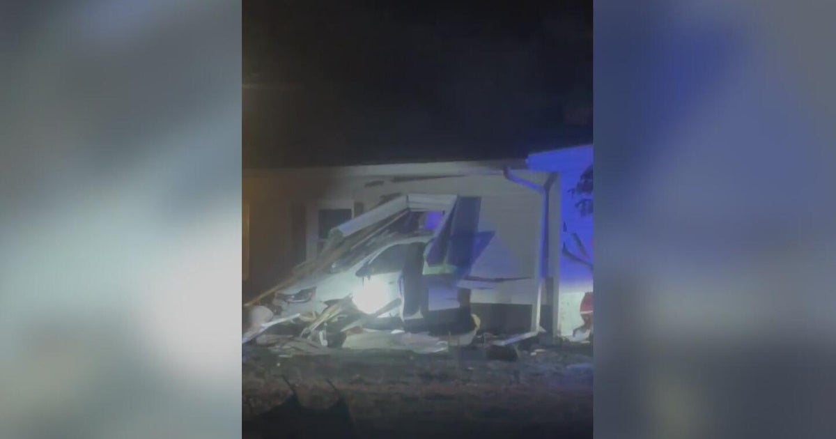 Neighbors speak out after vehicle crashes into car Michigan home ...
