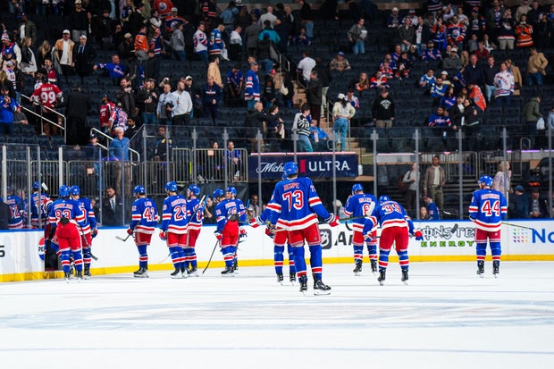 The New York Rangers leave the ice after suffering their third straight home defeat via shutout against the Edmonton Oilers at Madison Square Garden on October 14, 2025 in New York City.