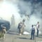 Federal agents use tear gas on Chicago crowds, undercutting temporary restraining order