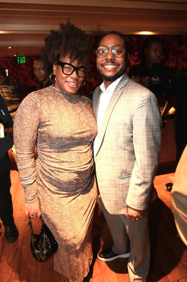 People post for a photo at the opening of Kitchen + Kocktails, a restaurant in Philadelphia