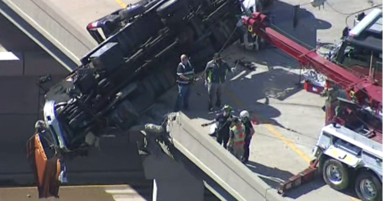Tow Truck Hangs Over McKinney Overpass Driver Rescued Safely