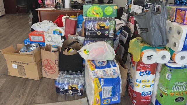 A large pile of household items and food donated for the family of Kada Scott 