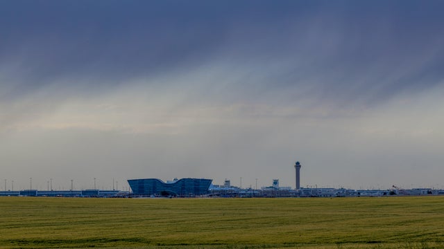 Denver International Airport against the stormy sky 