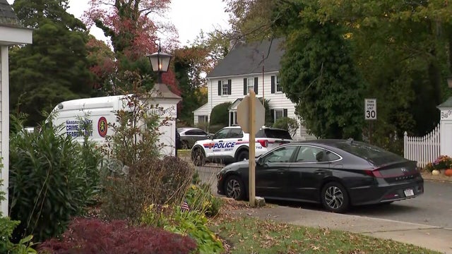 Police vehicles outside Massapequa home