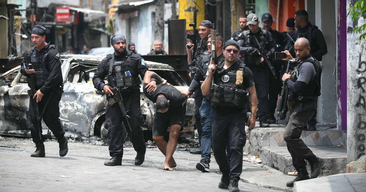 Raid on gang in Rio leaves at least 64 people dead, including police officers