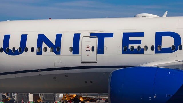 Closeup at the UNITED logo inscription in the side of the fuselage.