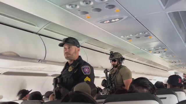 bomb threat Frontier Airlines, DFW 