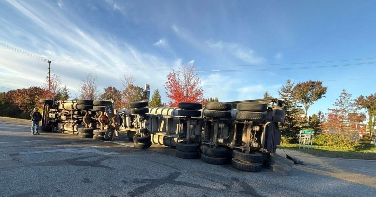 Grain hauler spills cargo on entrance ramp to U.S. 23 in Monroe County