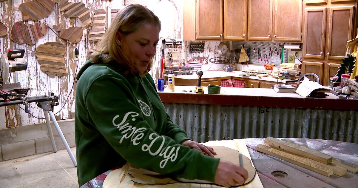 Central Minnesota woman turns old barnwood into works of art