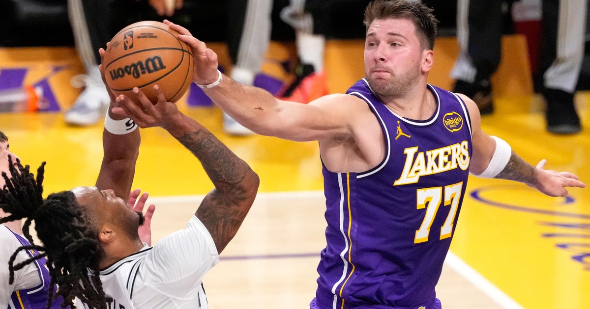 Doncic scores 35, and the Lakers survive a frantic final second for a 118-116 win over the Spurs