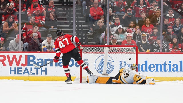 Paul Cotter #47 of the New Jersey Devils scores a goal on Arturs Silovs #37 of the Pittsburgh Penguins during a shootout of a NHL game at Prudential Center on November 8, 2025 in Newark, New Jersey. 