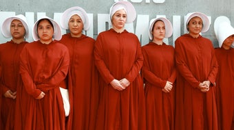 What inspired the outfits in Margaret Atwood's "The Handmaid's Tale" 