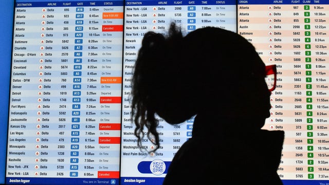 Several canceled flights are displayed on a departures board at Boston Logan International Airport in Boston, Massachusetts, Nov. 10, 2025. 