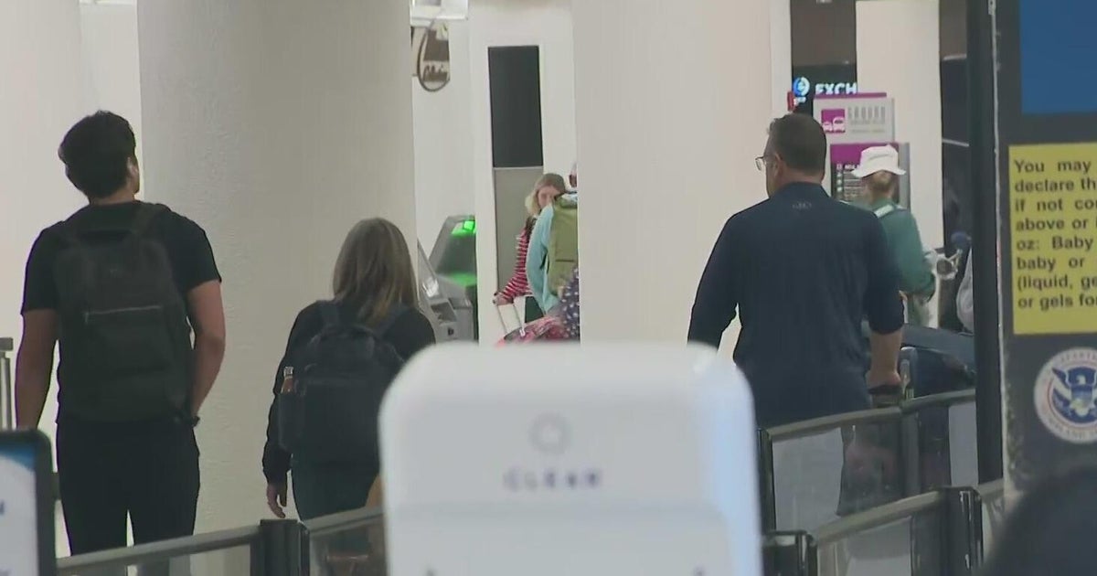 Travelers concerned over dozens of delays, cancellations reported at Miami International Airport