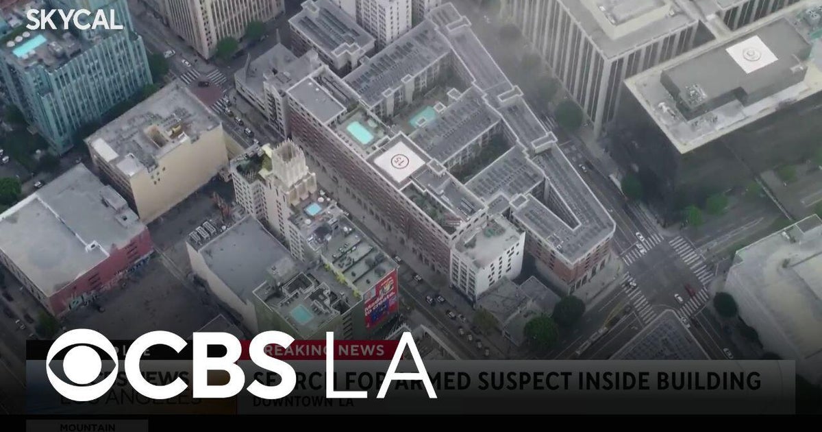 Police search for armed suspect in downtown Los Angeles high-rise ...