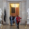A tour guide leads a group through the U.S. Capitol in Washington, D.C., on Nov. 13, 2025, a day after the government reopened. 