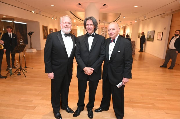 People pose for a photo at the 27th Annual Bacchanal Wine Gala and Auction 
