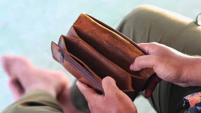 Poor people go bankrupt, empty wallet (no money) 