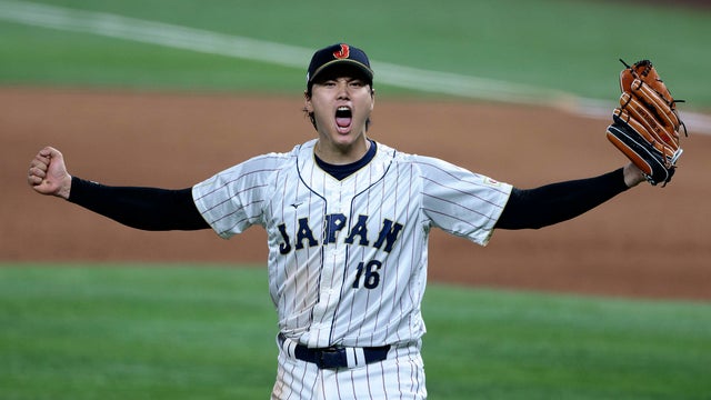 Close up view of Fragment of Permanent resident card (Green) card of USA on blurred background. 
