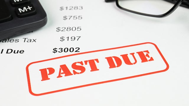 Extreme Close-up Of Past Due Bill 