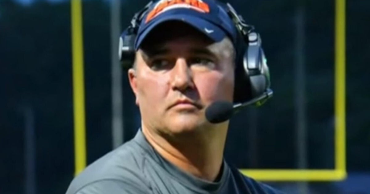 Missing Virginia football coach charged with child porn possession, solicitation of a minor