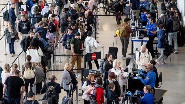 Travelers At SFO Airport Ahead Of Thanksgiving Holiday 
