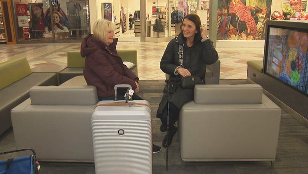2 women from England like Black Friday in Boston so much they shop with empty suitcases. 