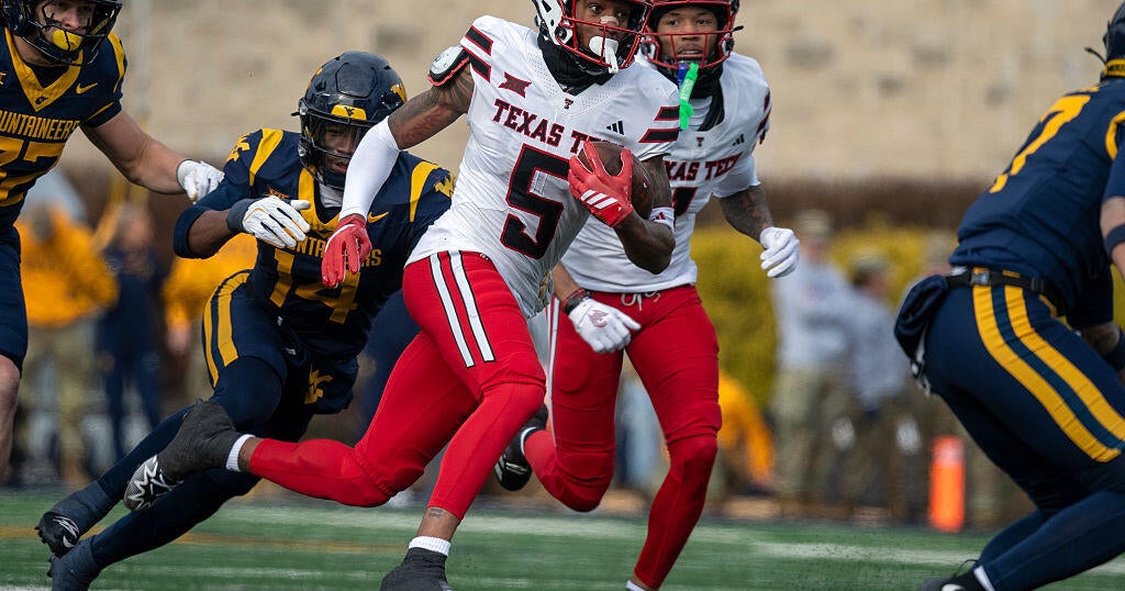 Morton throws for 3 TDs, LB Rodriguez scores on offense as Texas Tech whips WVU 49-0