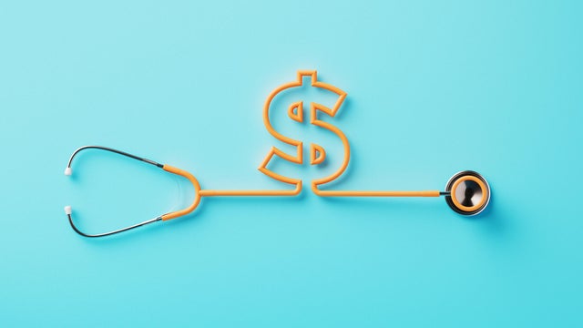 Orange Stethoscope Forming A Dollar Sign On Blue Background 