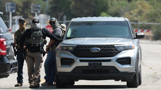 ICE agents stage outside Gate E of Dodger Stadium 