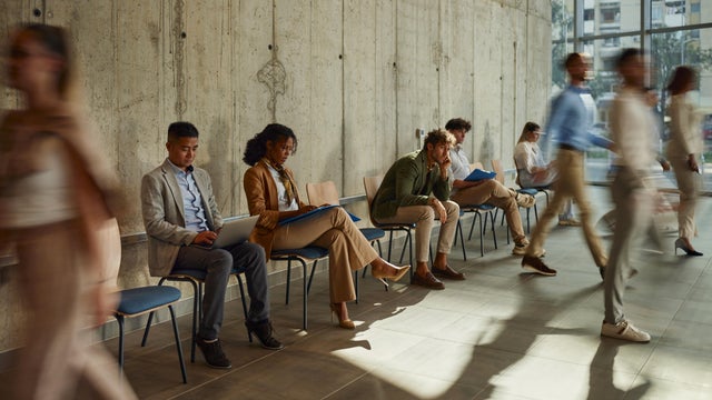 Group of business people waiting for job interview in the office. 