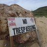 trespassingsignepsteinisland.jpg 