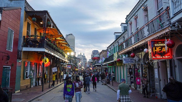 People walk on Bourbon Street in New Orleans on Nov. 29, 2025. 