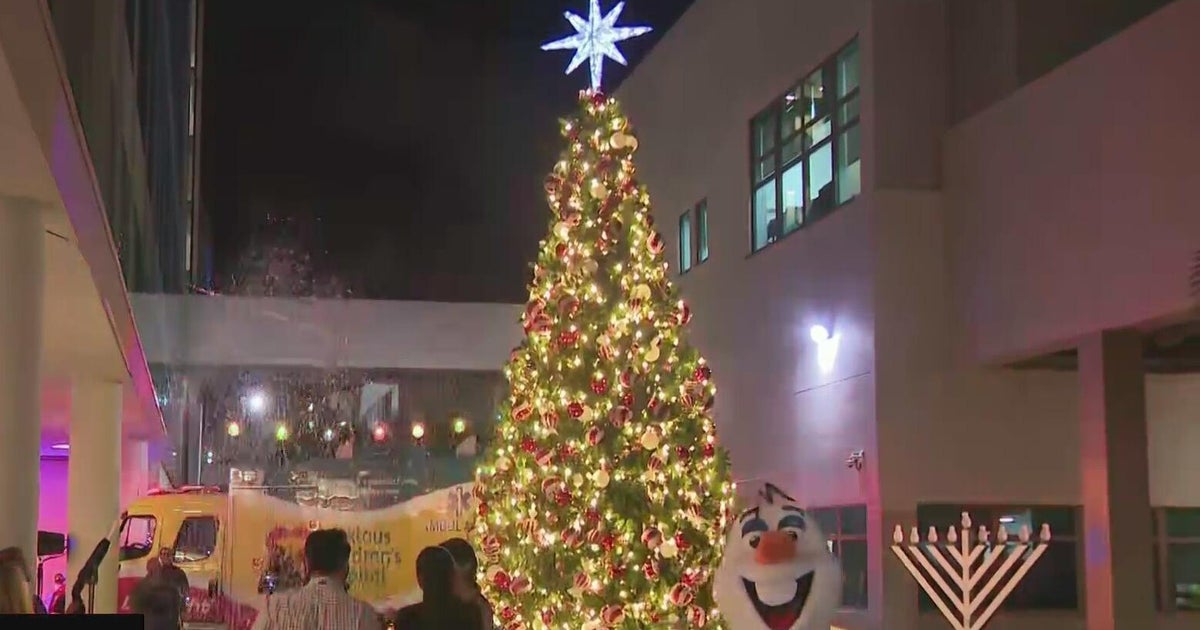 Holiday cheer as Nicklaus Children’s Hospital lights Christmas tree with snow and celebration