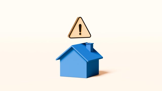 House Symbol with Yellow Warning Triangle Hovering Above – Home Safety and Risk Awareness 