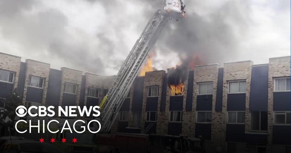 Firefighters battle extra-alarm fire in frigid cold near O'Hare - CBS ...