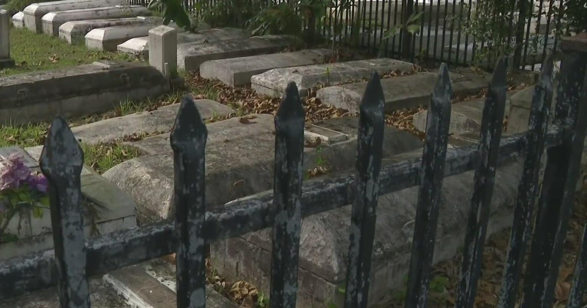 Artist works to restore faded names at historic Coconut Grove cemetery