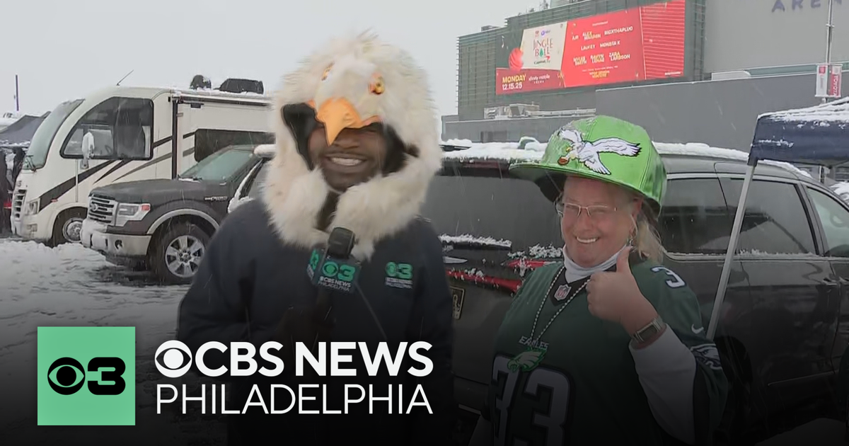 Eagles fans brave the snow and cold hours before kickoff at Lincoln Financial Field