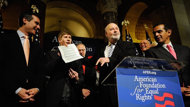 Director Rob Reiner, center, speaks at press conference flanked by HBO's Chris Albrecht, right, and 