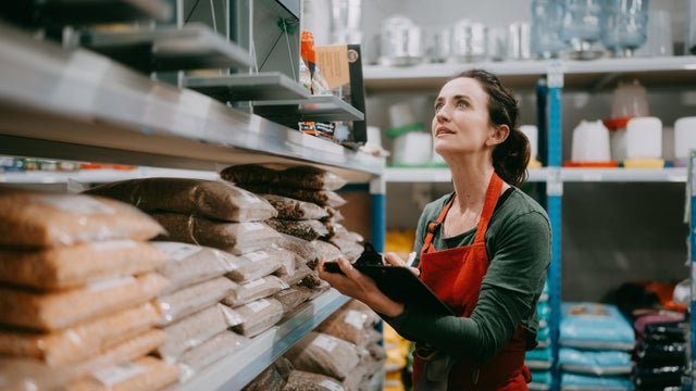 Woman checking stock in store 