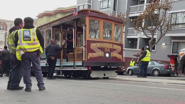 Emergency responders seen near a San Francisco cable car 