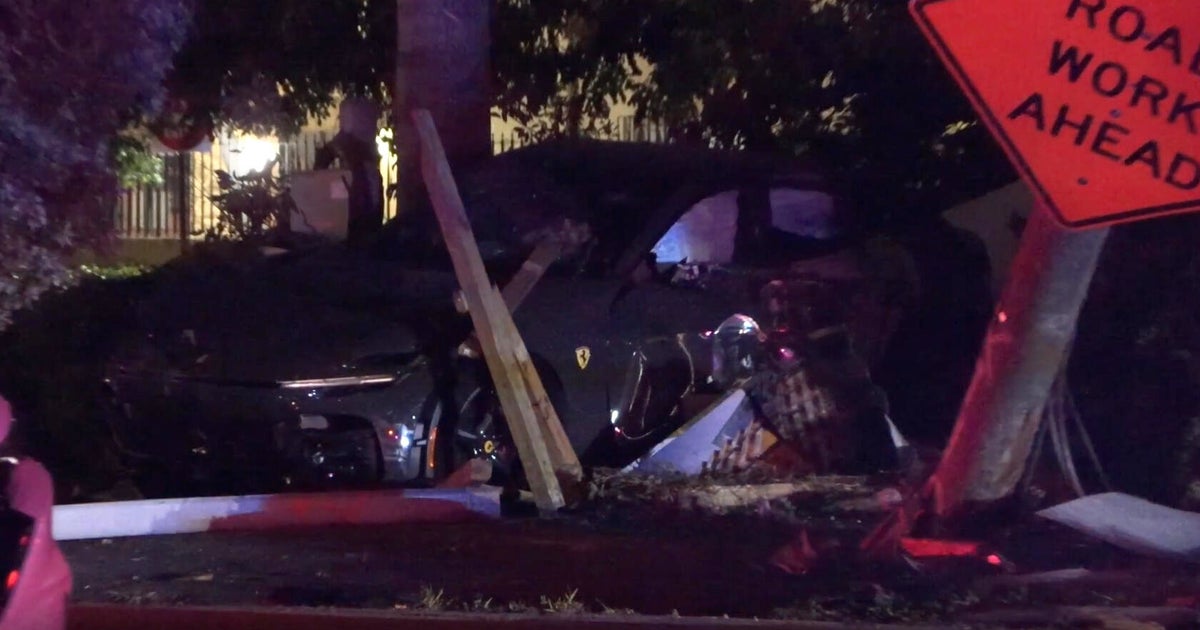 Investigation underway in Miami after Ferrari slams into Brickell utility pole, knocking out power