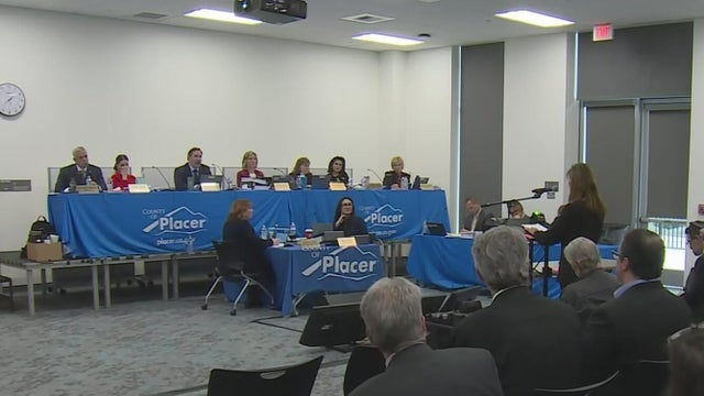 Placer County supervisors sit during a board meeting 