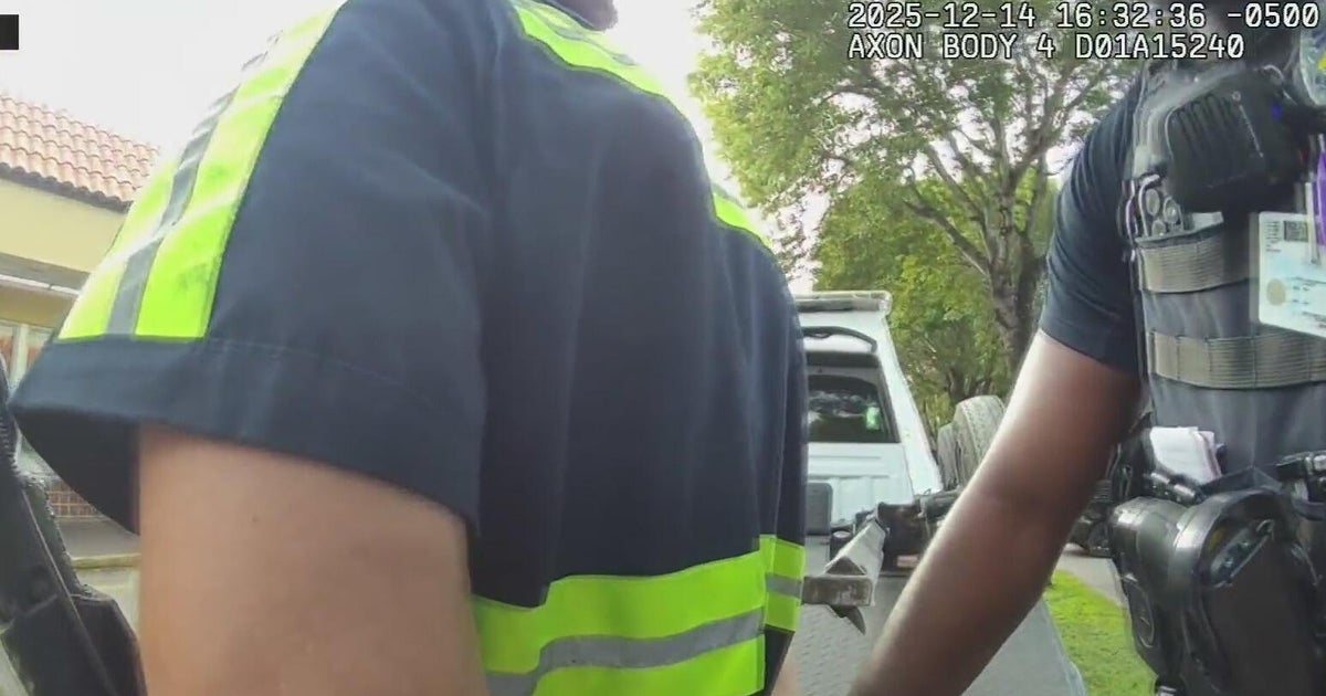 Video shows arrest of Broward County tow truck driver who hauled away car with young child inside