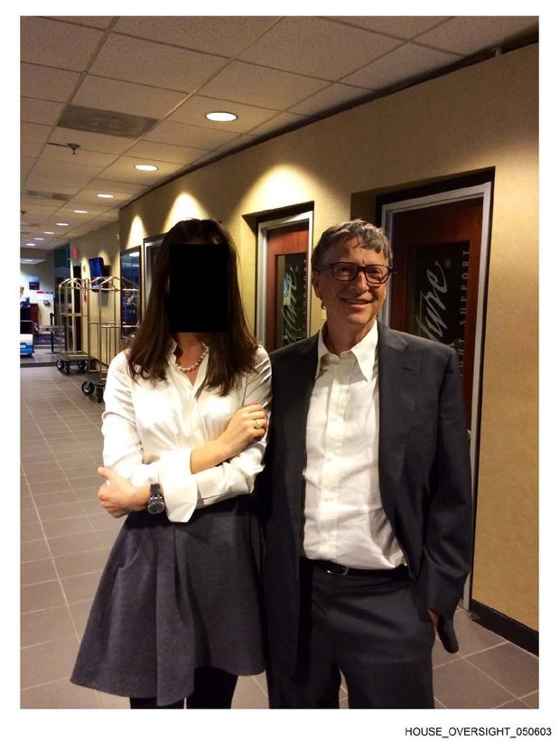 Bill Gates with an unknown person whose face is redacted, in a photo that the Jeffrey Epstein estate provided to Congress.