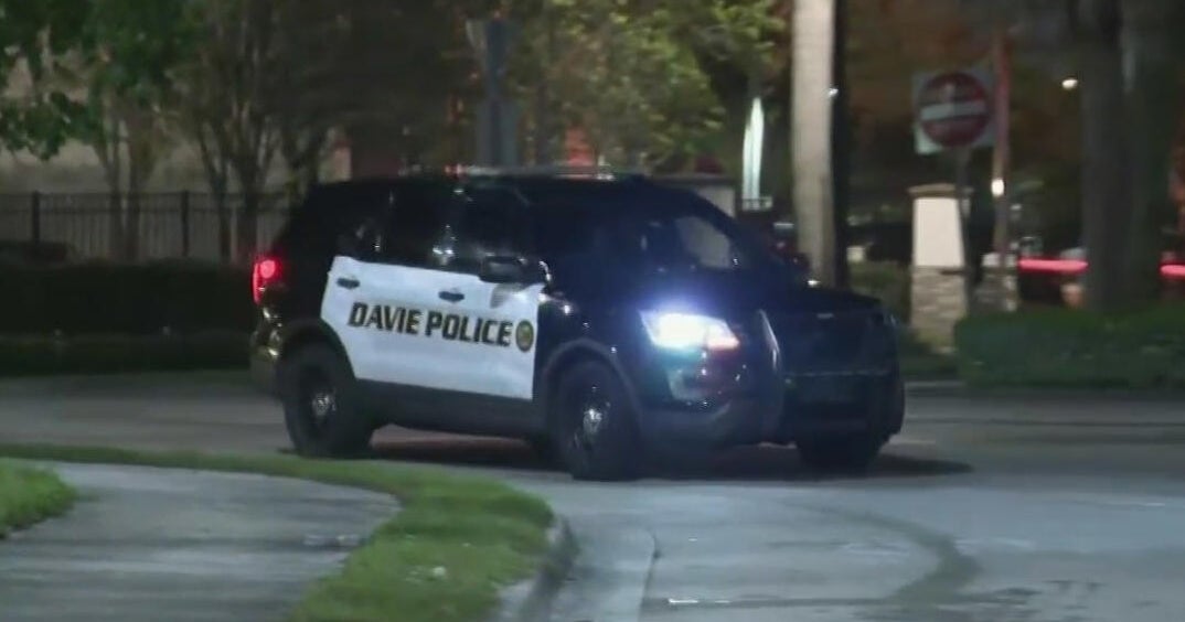 Davie police officer opens fire after being hit by fleeing vehicle, officials say