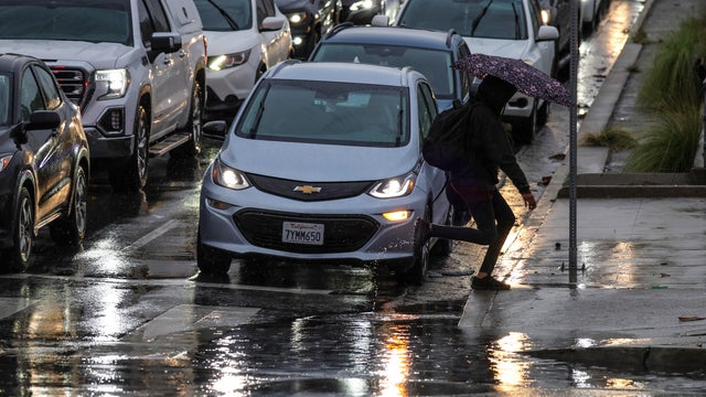 Rain falls on downtown. 