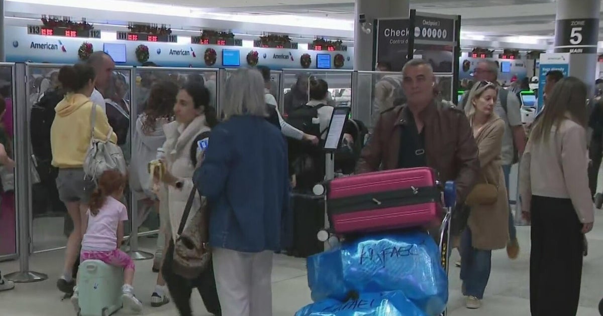 Miami International Airport seeing long TSA lines as travelers make their way home after Christmas