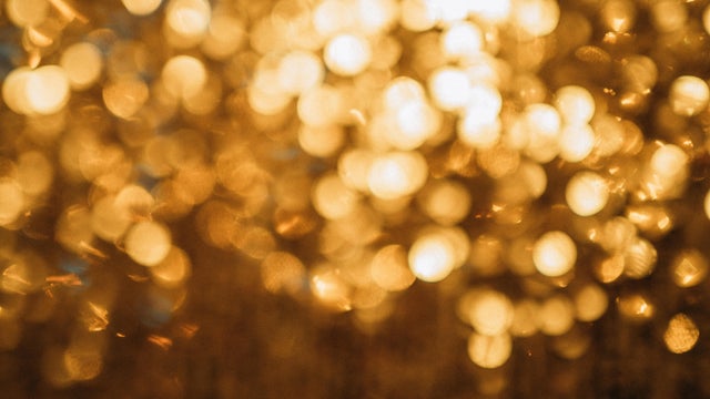 Abstract blur glowing golden color  background 